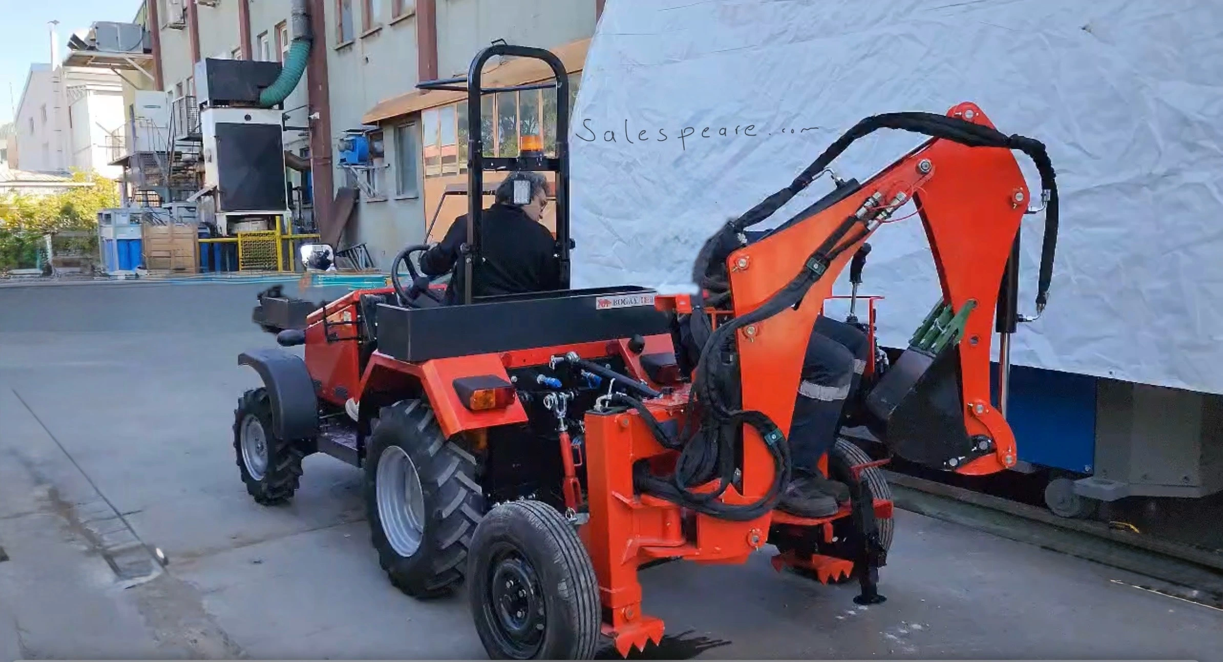 Mini tractor with trenching bucket attachment