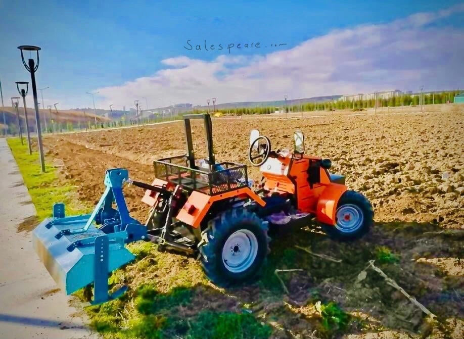 Mini tractor with rotovator attachment
