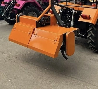 Soil hoeing rotovator attachment for mini tractor